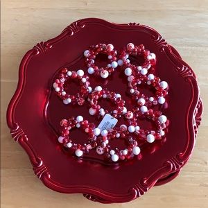 4 Red Chargers & 8 napkin ring holders